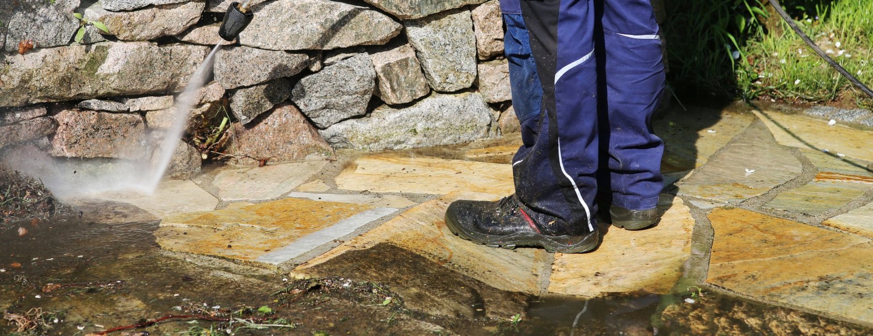 Pressure washing an outdoor patio